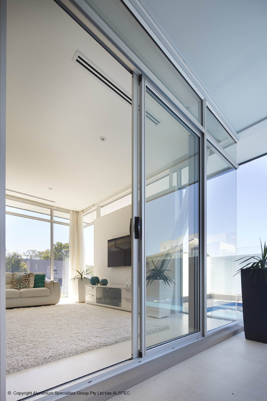 Floor to ceiling glass windows in home